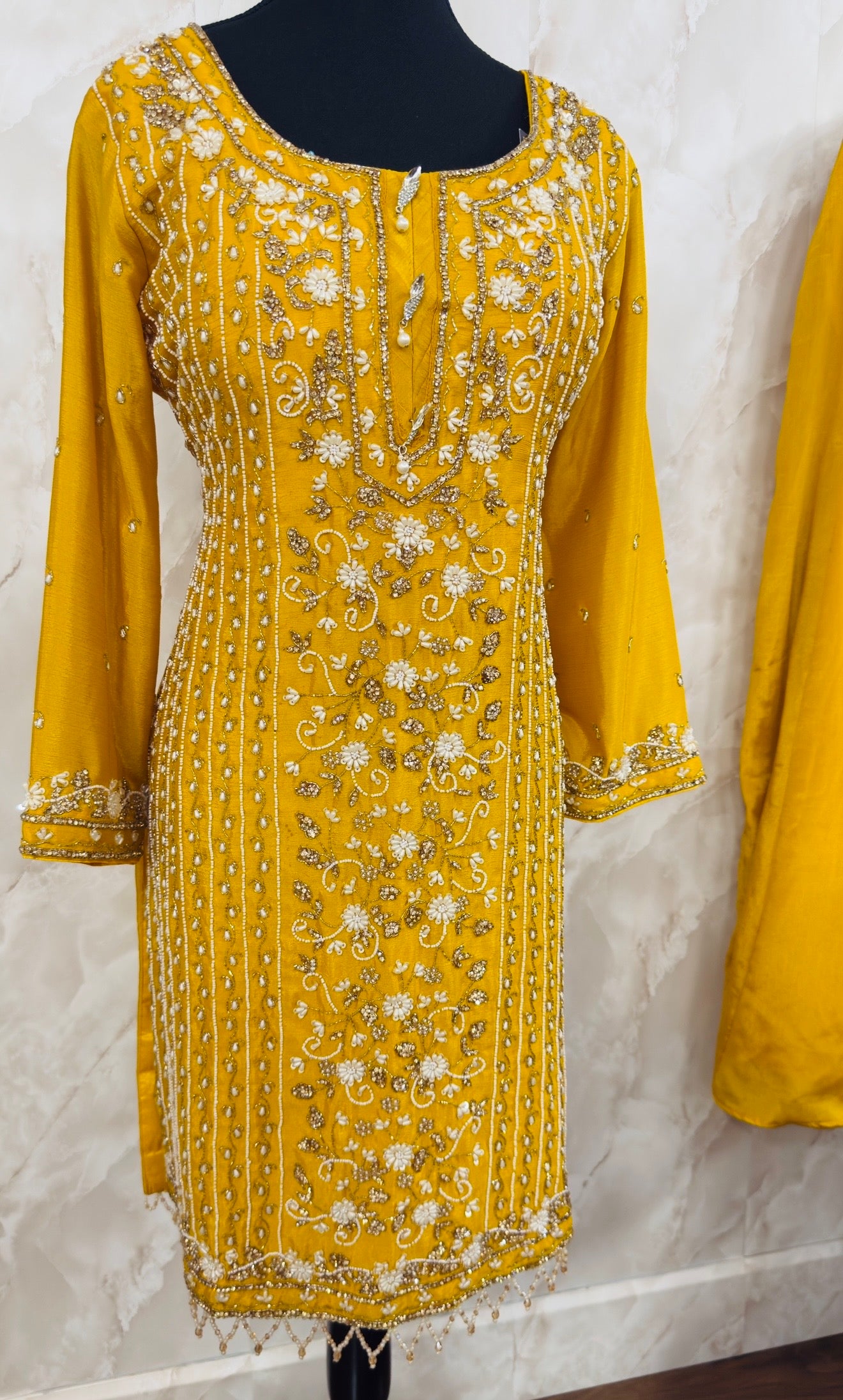 Chinnon hand and stone work sharara suit