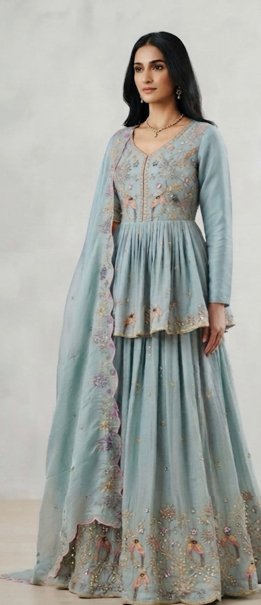 Shimmer silk embroidered peplum lehnga