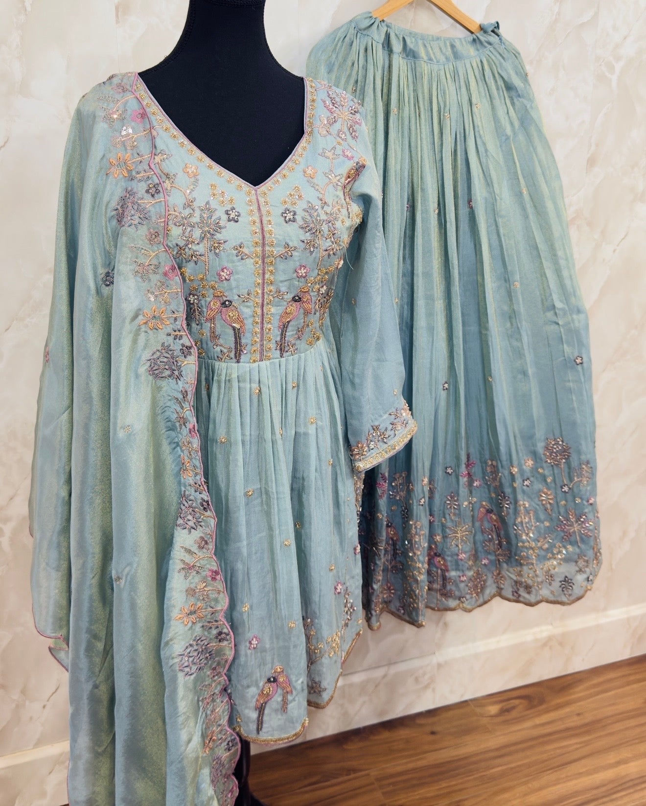 Shimmer silk embroidered peplum lehnga